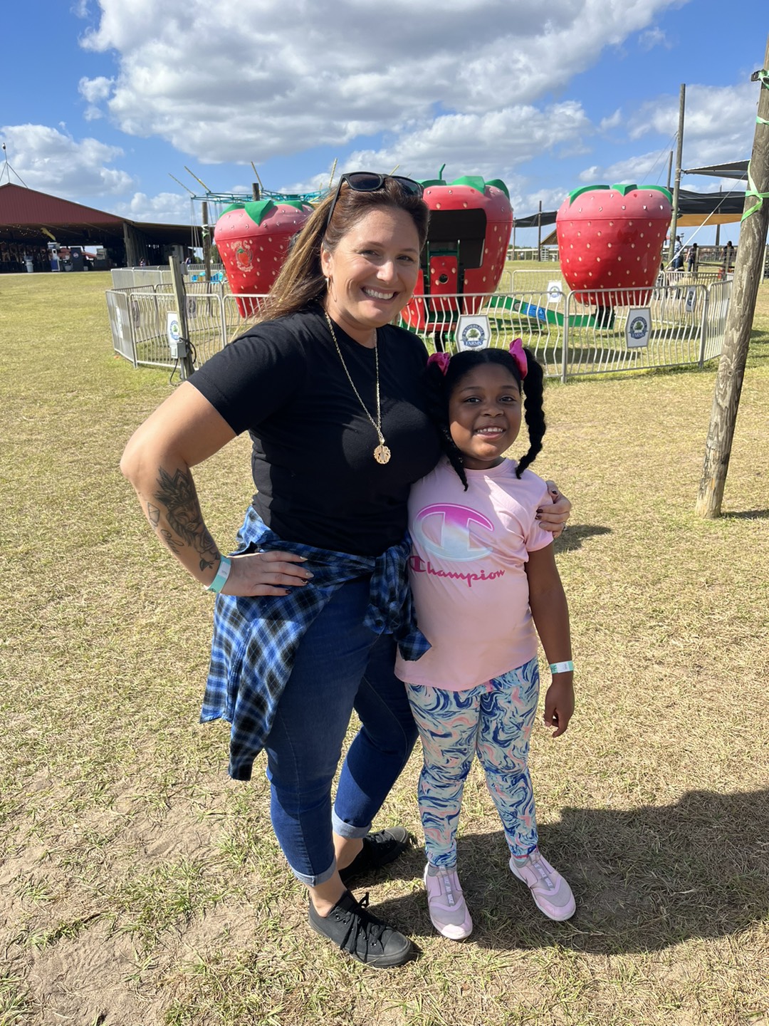teacher with girl student in the park