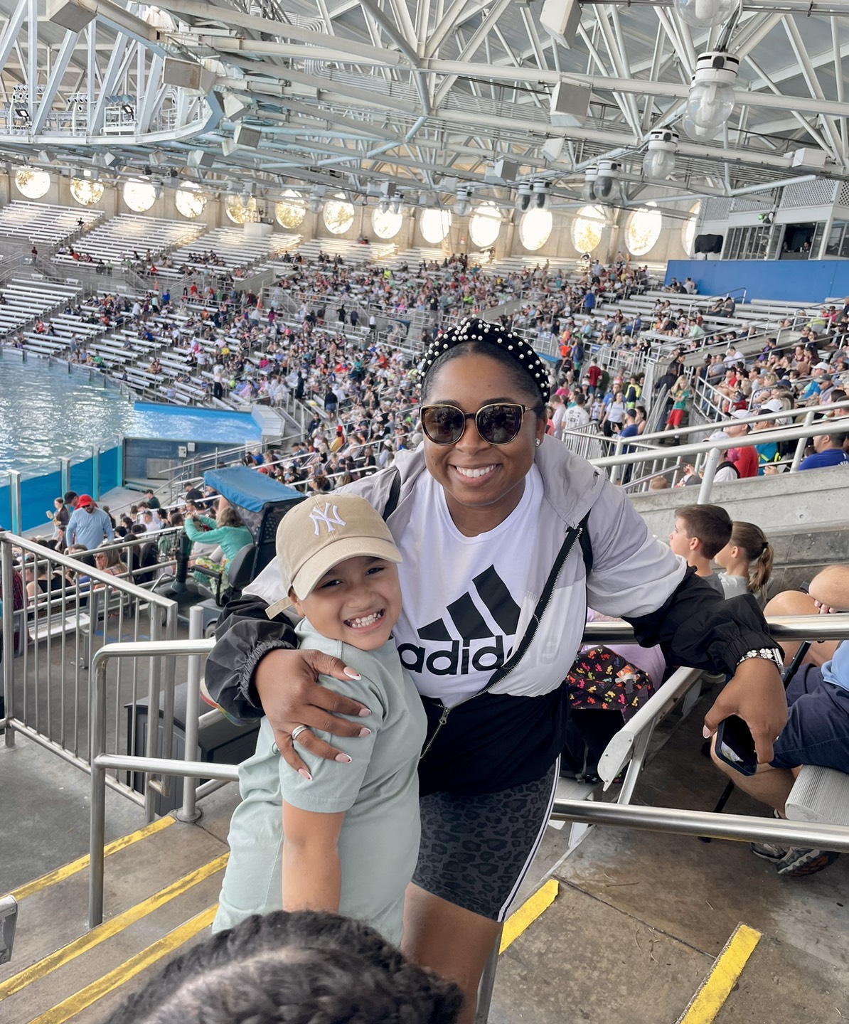 Happy boy and teacher in the sea world presentation