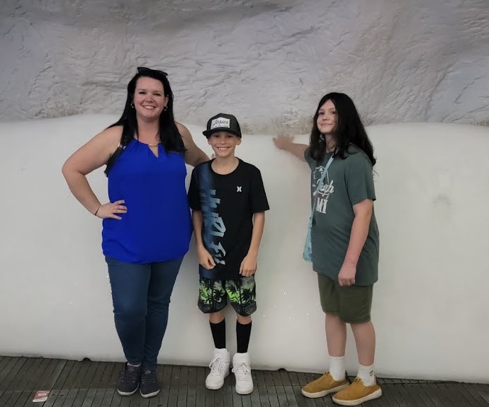 teacher and students in the sea world