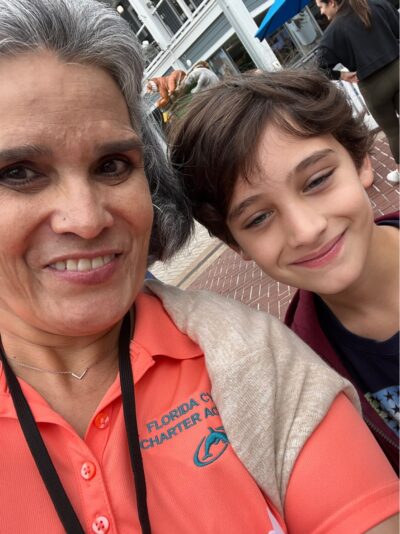 teacher with student in the zoo