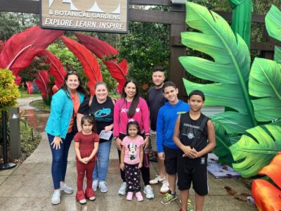 Group of teachers and kids in the zoo