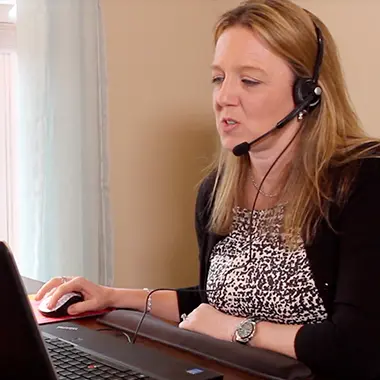 Florida teacher using her laptop