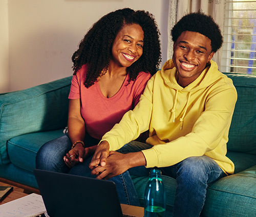 Mother and son smiling to the camera