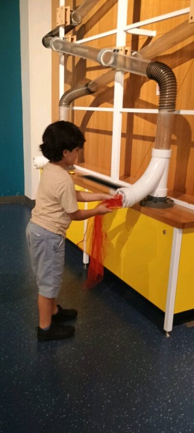 boy playing at the museum